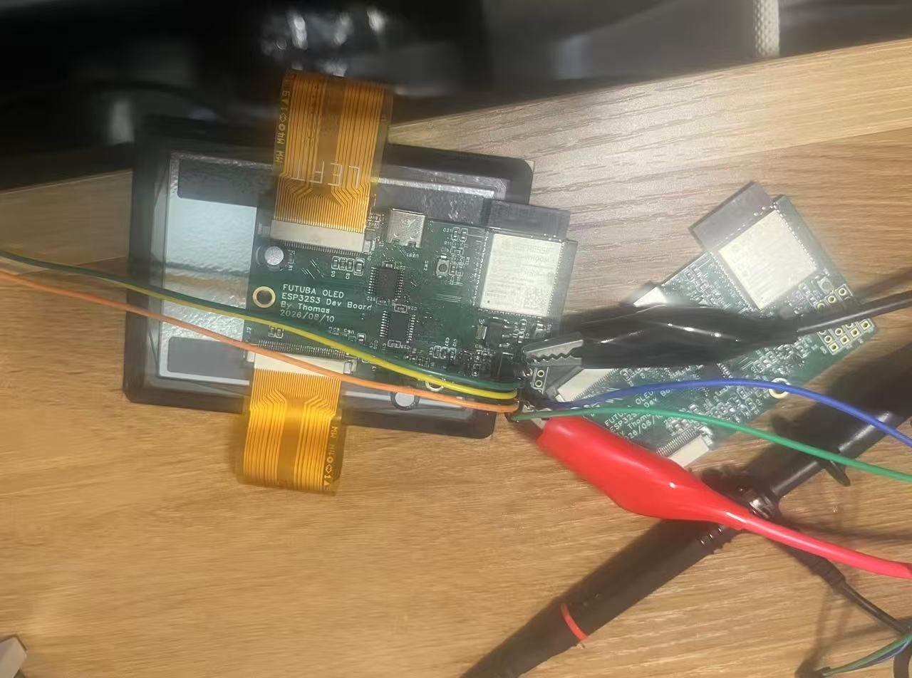 The ESP32-S3 driver board mounted on the back of the Futaba OLED with both FPCs connected